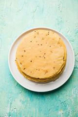 Gujarati papad or papadum in raw dried form with roasted cone, roll and flat variation