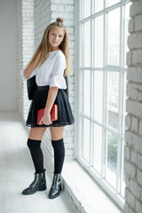 Fashion school. Girl teenager schoolgirl. 