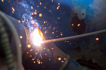 The process of welding metal, macro, repair work