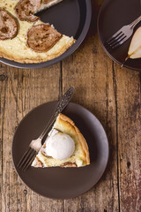 Piece of Homemade Pears Pie Decorated With Ice Cream on Plate Autumn Homemade Cake Dessert Wooden Background