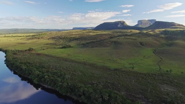 Aerial view of Canaima National Park tepuis: Kurun, Kusary and Kurawaik.  Venezuela. Canaima is visited for tourist all around the world.