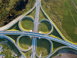 Summer aerial photo of transport junction, traffic cross road junction day view from above