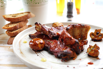  Grilled ribs glazed with marinade barbecue. Main course
