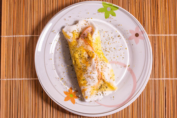 Delicious tapioca from manioc flour with cheese. Brazilian typical food.