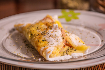 Delicious tapioca from manioc flour with cheese. Brazilian typical food.
