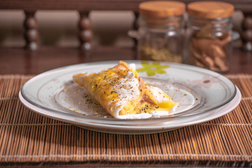 Delicious tapioca from manioc flour with cheese. Brazilian typical food.