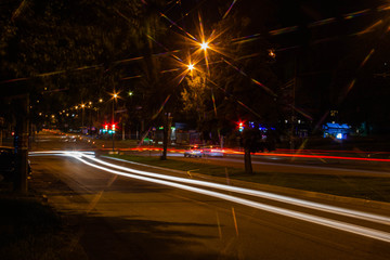 Fototapeta na wymiar Night road. Frozen light lanterns. Freezligt