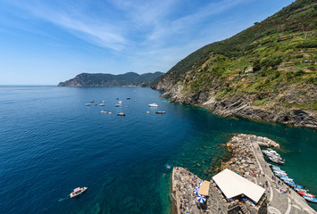 Naklejka na ściany i meble Aerial view of the port of the ancient village of Vernazza. Cinque Terre, National park in Liguria, La Spezia province, Italy, Europe. UNESCO world heritage site
