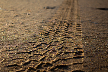 tire tracks in sand