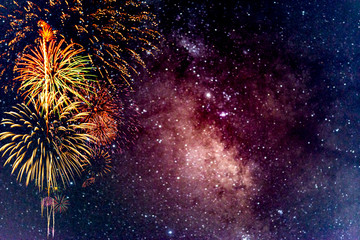 Fireworks with blur milky way background