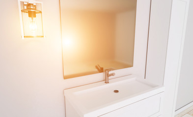 bathroom in a minimalist style. room in gray tones. foggy mirror. 3D rendering. Sunset.