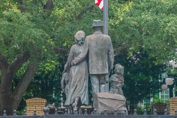 Tampa Bay, Florida. July 12, 2019. Tampa Bay, Florida. July 12, 2019 . Inmigrant Family Statue in Centennial Park at Ybor City 1