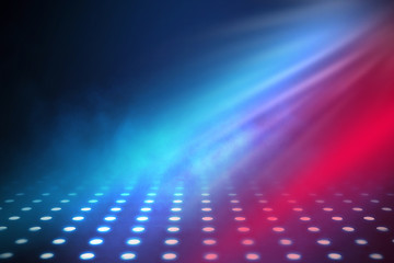 Empty background scene. Dark reflection of the street on the wet asphalt. Rays of blue and red neon light in the dark, neon figures, smoke. Background of empty stage show. Abstract dark background.