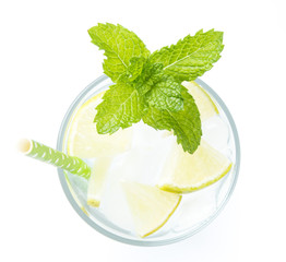 Glass of lime soda drink isolated on white background.