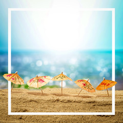 A summer day on a sandy beach. White frame with a beautiful sea view and empty space for an...