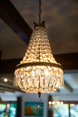Old crystal chandelier with beautiful light.