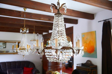 Old crystal chandelier with beautiful light.
