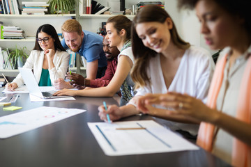 Successful group of business people at work in office