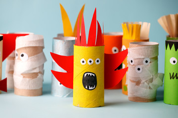 halloween and decoration concept - monsters from toilet paper tube/ Simple diy creative idea. Eco-friendly reuse recycle decor