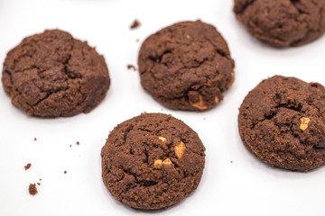 Tasty chocolate cookies isolate on white background.