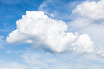 Naklejka na ściany i meble White cumulus cloud in blue sky at daytime