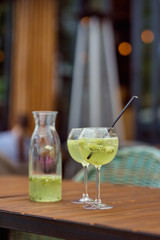 Glass with green summer cocktail