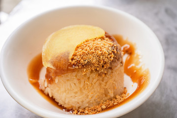Rice pudding (Tube rice cake), popular delicious taiwanese street food gourmet delicacy, made by glutinous rice and pork with sweet chili sauce.