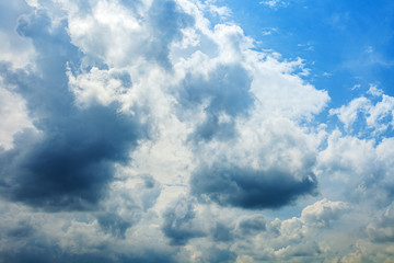 White fluffy clouds in the blue sky