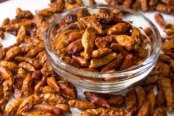 red hot pepper scattered on the table