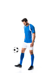 handsome soccer player training with ball Isolated On White