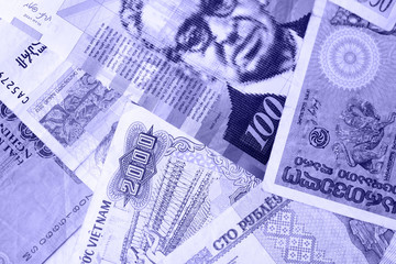 Various banknotes from different countries close-up (Belarusian rubles, Georgian lari, Polish...
