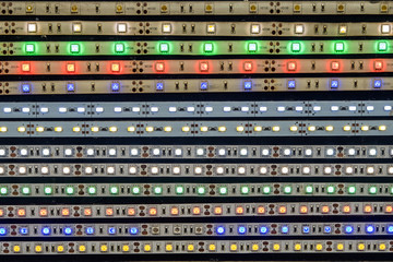 The market for electrical materials. Sale tapes with LED bulbs. Abstract background with LED lighting. Summer. Day.