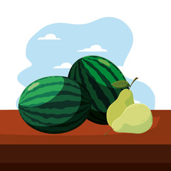 fresh fruit pears and watermelon on table outdoors