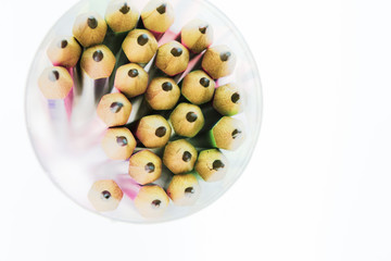 colored pencils on white background