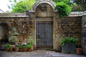 ornate wall with ornate wooden door