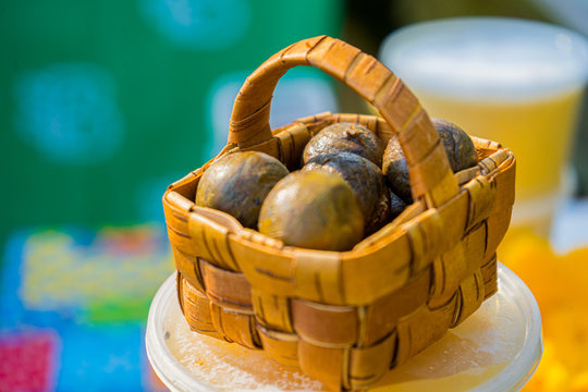 Propolis balls in a small basket on local market. Health products.  Beekeeper Products.