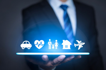 Insurance concept. Businessman with car, family, life and health insurance icons.