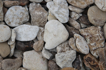 Texture of stones on seashore. Natural background