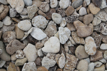Texture of stones on seashore. Natural background