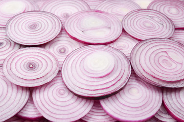 Onion slices as a background. Top view.