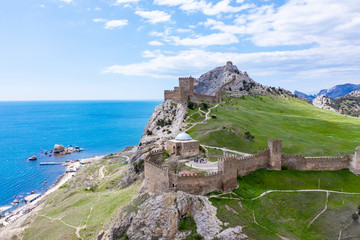 Fototapeta na wymiar Genoese fortress in the Sudak bay on the Peninsula of Crimea. Aerial drone view