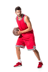handsome basketball player in uniform with ball Isolated On White