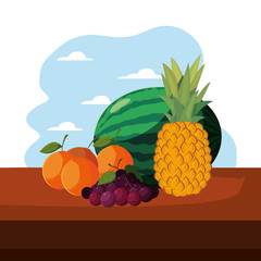 watermelon pineapple orange and grapes fresh fruit on table outdoors
