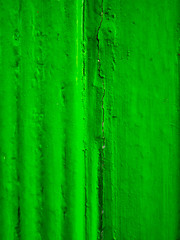 Obraz premium Old green paint on a wooden house