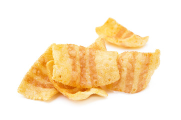 Fried wheat-potato snack with smoked bacon flavor isolated on white background