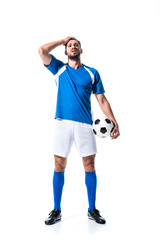 disappointed soccer player with ball and hand on head Isolated On White © LIGHTFIELD STUDIOS
