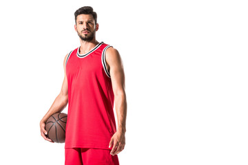 handsome basketball player with ball looking at camera Isolated On White