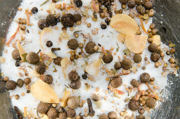 spices from coriander seeds, salt, dried garlic, pea pepper and sugar.