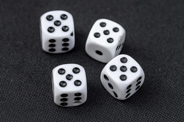 Dice Rolled 4 Fives on Black Table