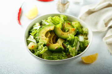 Healthy avocado salad with lemon dressing